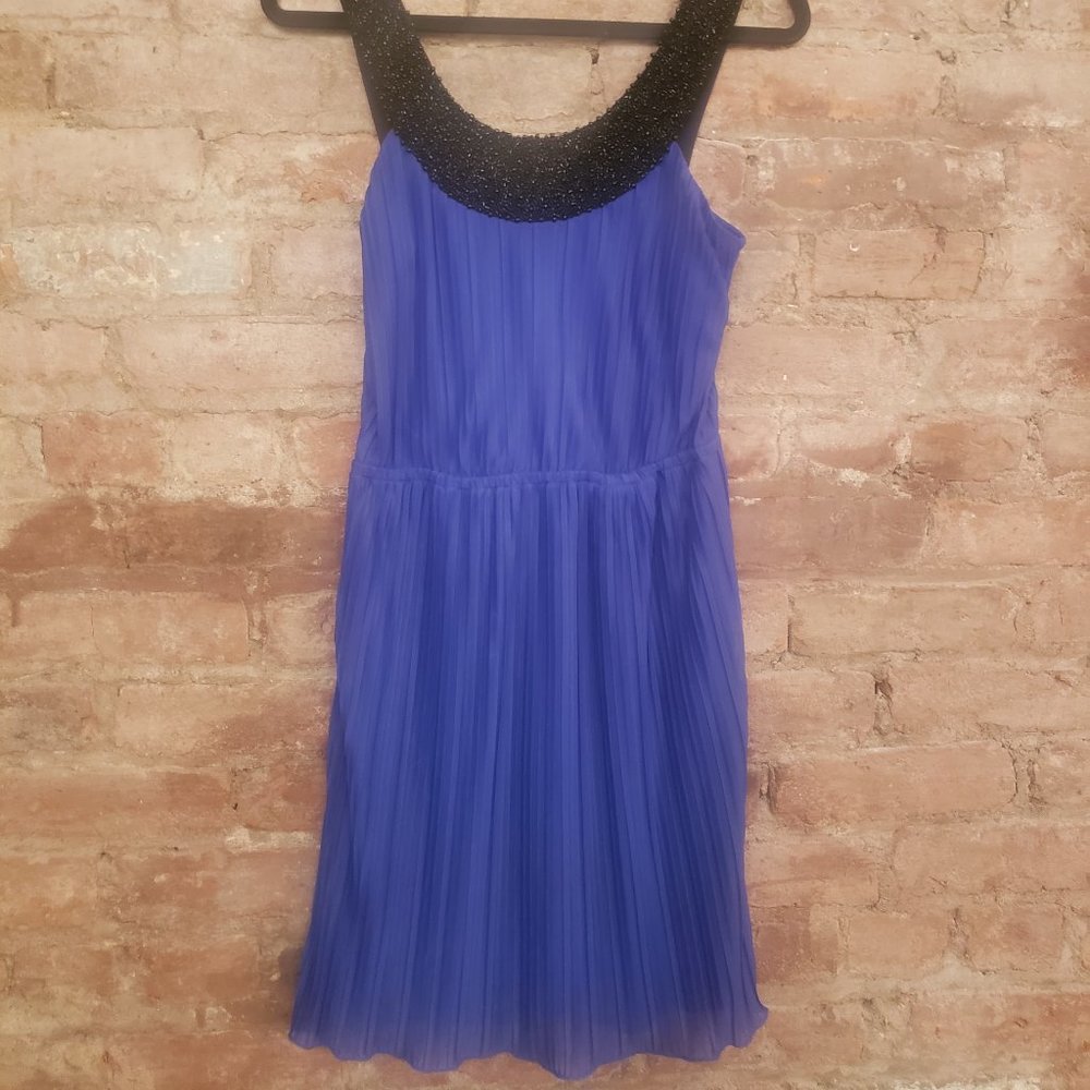 Pleated purple blue dress with black beaded straps and neckline